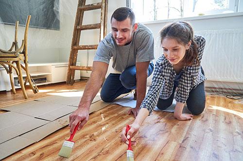 Couple staining floor