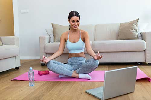 Woman teaching yoga